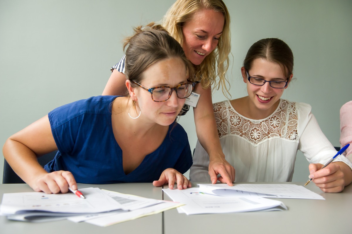 Three women in learning situation